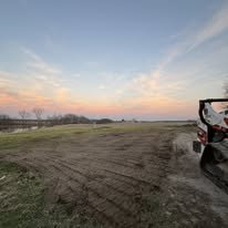 Site grading at sunset — Wever, IA